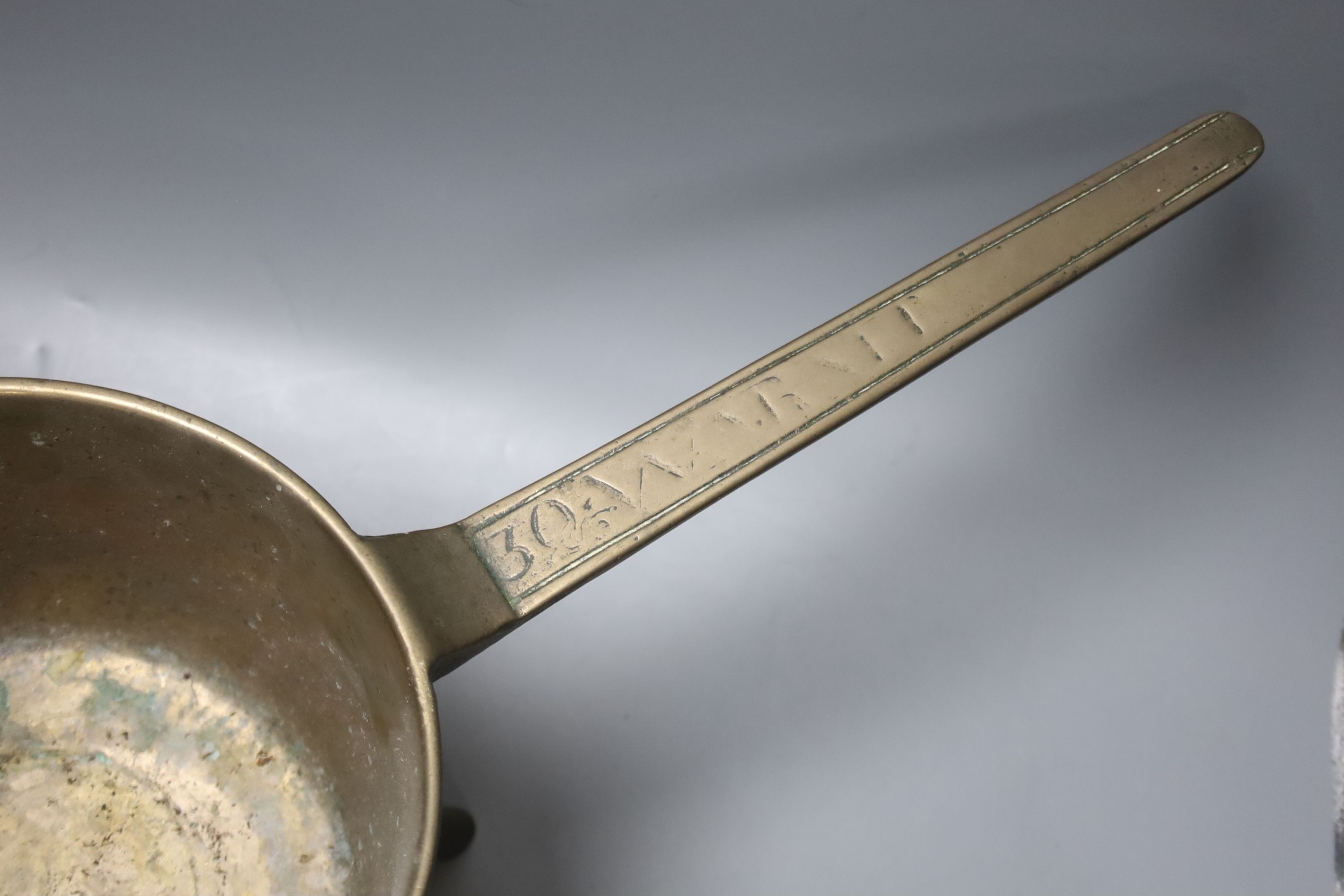 An 18th century ‘30’ bell metal skillet by Warner, by the Warner foundry, 21cm diameter